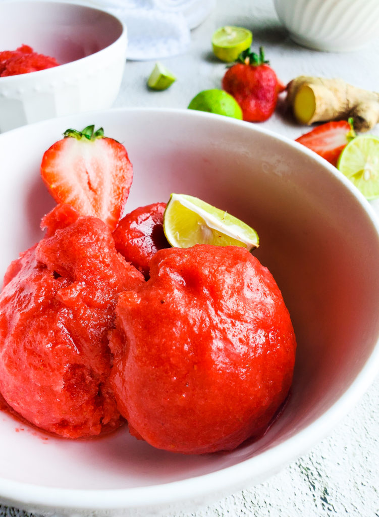 Scoops of strawberry key lime sorbet in a bowl